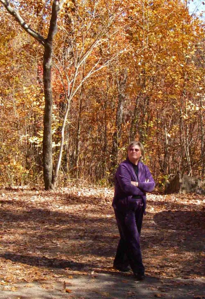 Becca admiring fall colors at Cherry Bend Trailhead. 
